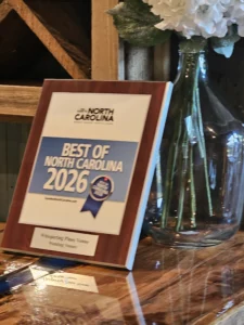 Framed Best of NC 2026 wedding venue award displayed at Whispering Pines Venue
